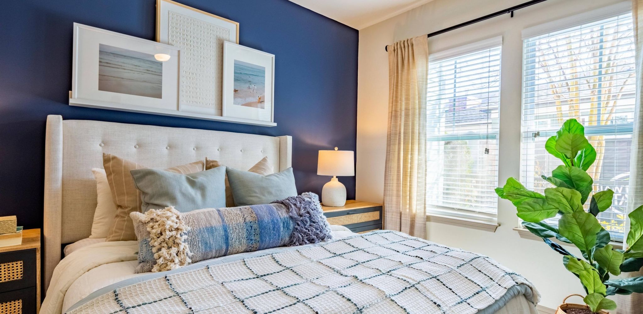 Hawthorne at the Station spacious apartment bedroom with carpet and large windows