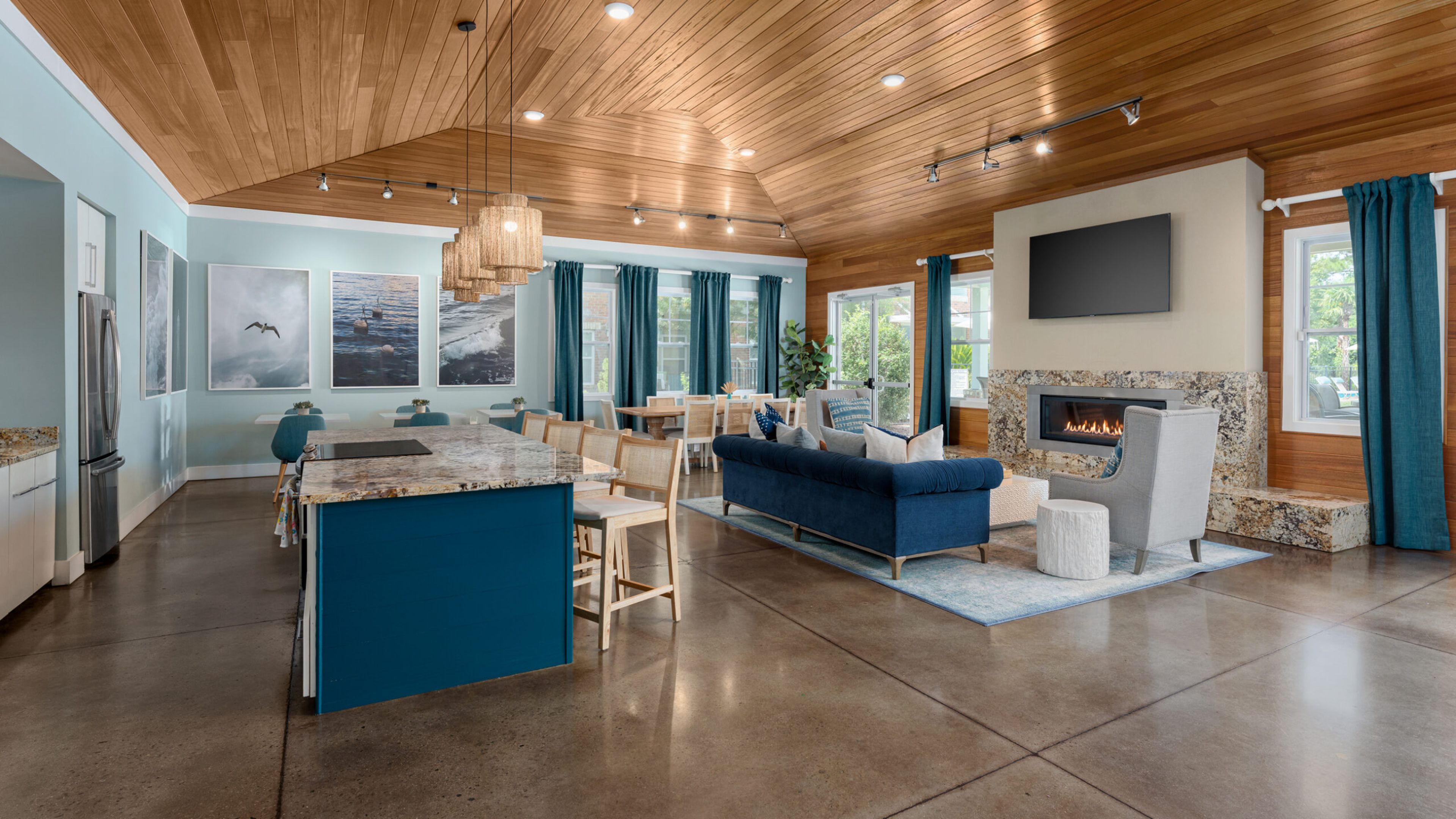 Hawthorne at the Station luxury outdoor pool with in-pool lounge chairs and surrounding seating